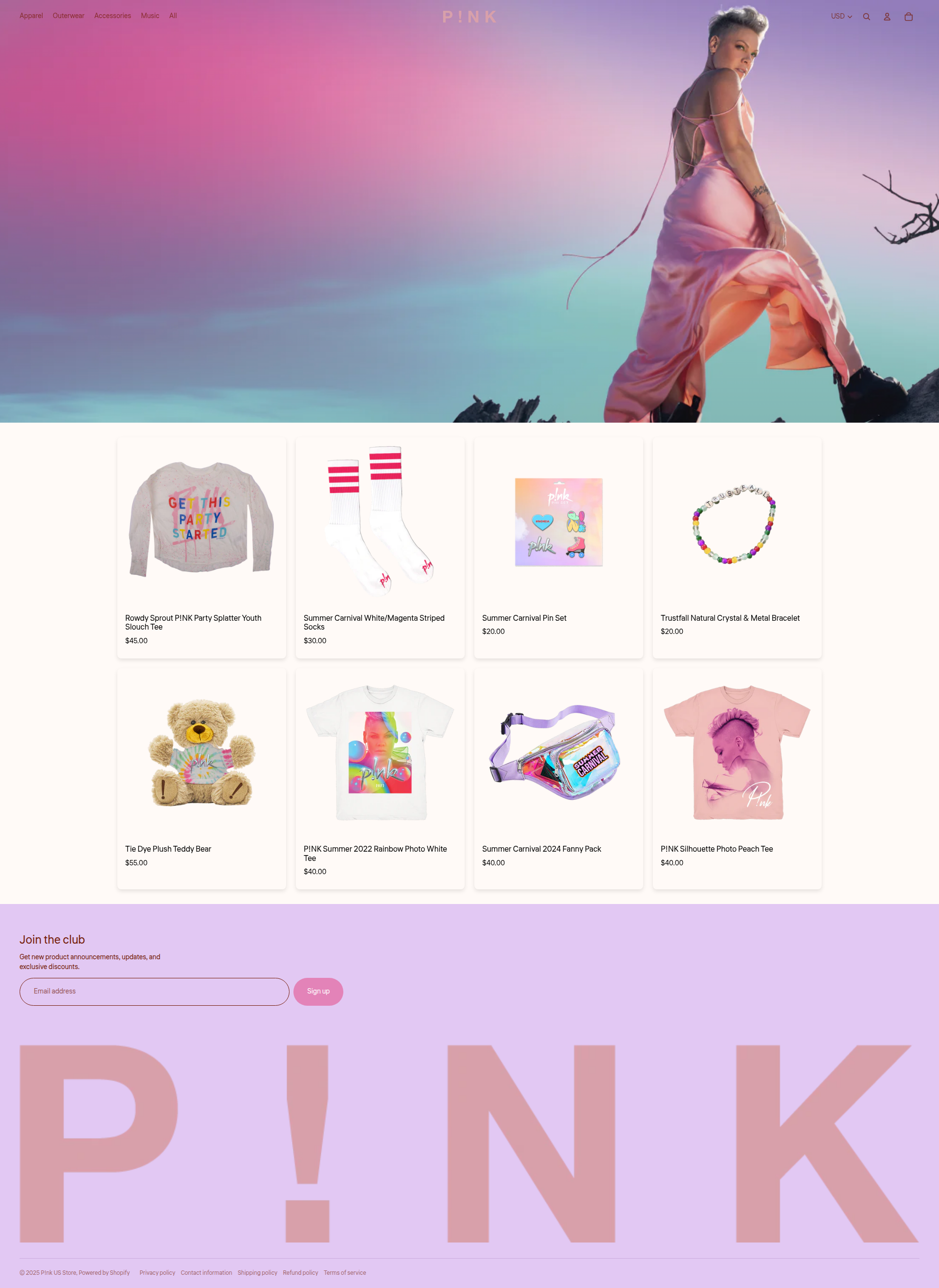 P!nk - This is P!NK's official merchandise homepage featuring a dramatic hero image of the artist against a purple-pink gradient sky, followed by a product grid showcasing various merchandise items including apparel, accessories, and collectibles, with a newsletter signup section and large P!NK branding at the bottom.