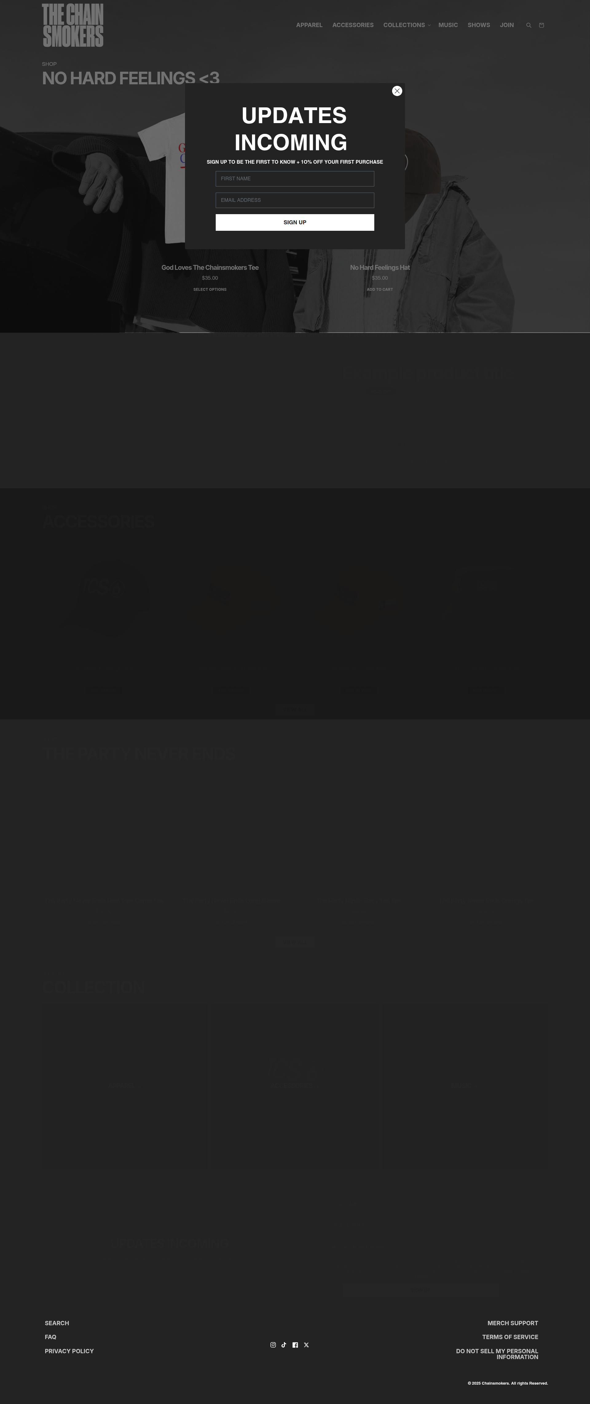The Chainsmokers - A dark-themed homepage for The Chainsmokers merchandise store featuring a prominent email signup modal overlay with 'UPDATES INCOMING' messaging, and product previews including a t-shirt and hoodie visible in the background.